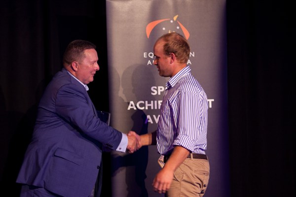 EA Domestic Athlete of the Year Clint Beresford congratulated by EA Board member Mark Hopkinson.