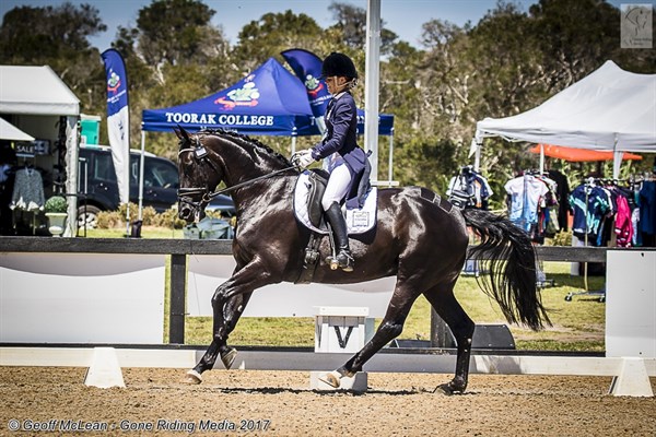 Natasha Moody and Diamonte Noir showing grace and style in the FEI Junior Team Test 14-18 years.