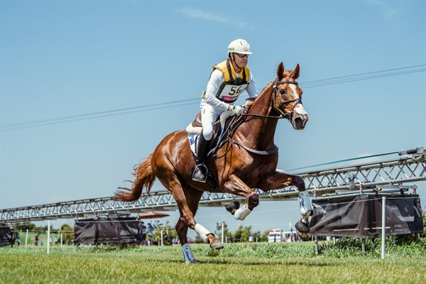 Andrew Hoy and Vassily de Lassos thundering down the cross country track in Tokyo. © FEI/Christophe Taniére