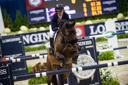 Beezie Madden with her defending World Cup champion mount Breitling LS. © FEI / Amy Dragoo