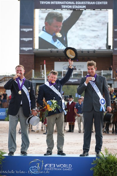 Boyd Exell with his medal (centre), silver medallist Chester Weber (right) and bronze medallist Edouard Simonet (left) - © Michelle Terlato