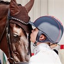 British Paralympic rider Sophie Wells shares a special bond with her horse Valerius. © Liz Gregg/FEI