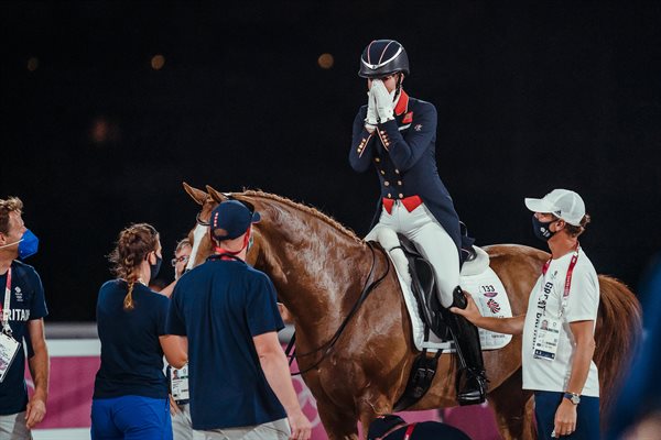 Charlotte Dujardin is thrilled with a bronze medal aboard Gio. © FEI/Christophe Taniére