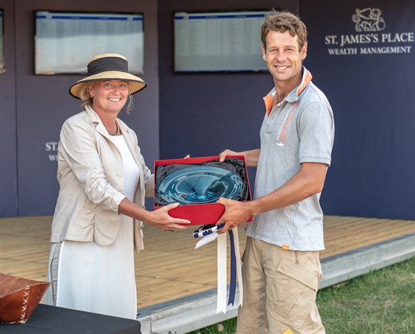 Chris Burton accepts the CIC2* prize for his ride on Bahira M - © William Carey
