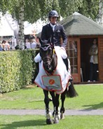 Ireland’s Darragh Kenny finished atop the podium with the black stallion Cazador LS