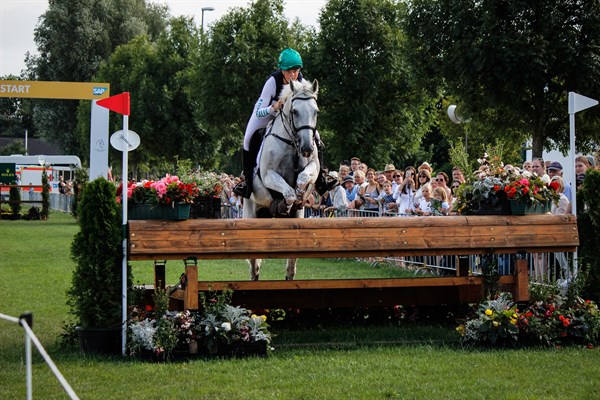 Isabel English and Feldale Mouse over the first fence.