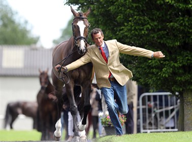 Mark Todd flies down the runway during the trot up. © Lorraine O’Sullivan