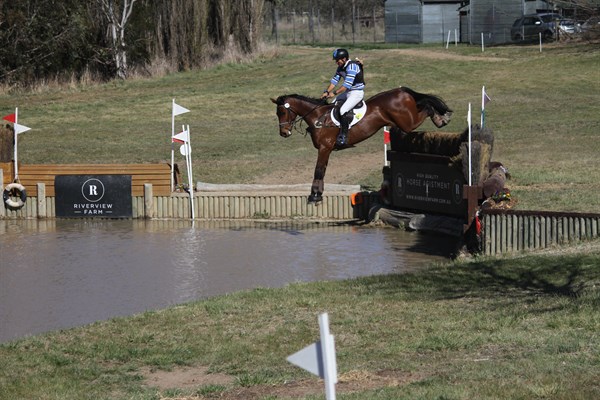 Shane Rose and Swiper leap into the water at the Canberra International Horse Trials. © Fiona Gruen form Wallaroo Equestrian