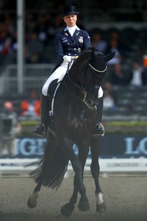 Therese Nilshagen riding Dante Weltino Old © Dean Mouhtaropolous/Getty Images for FEI